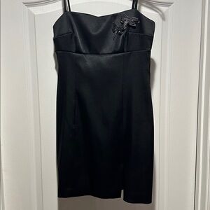 Hugo Buscati Elegant Black Dress with Dragonfly appliqué.